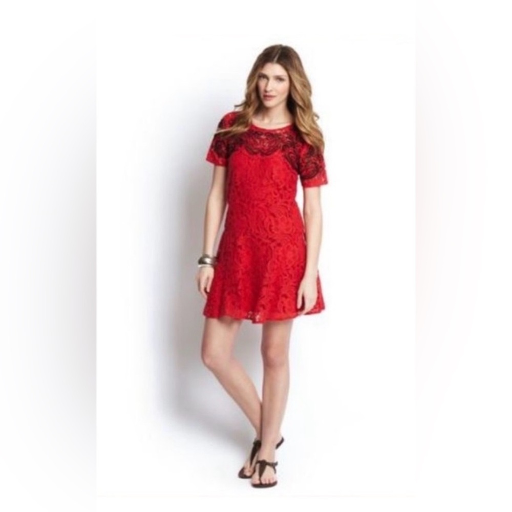 is a Free People Red Lace Embroidered Short Sleeve Dress